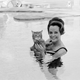 Illustration for article titled Heres a Lady Taking Her Cat for a Swim